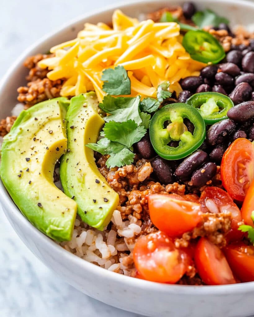 High Protein Beef Burrito Bowls with Flavorful Brown Rice Recipe