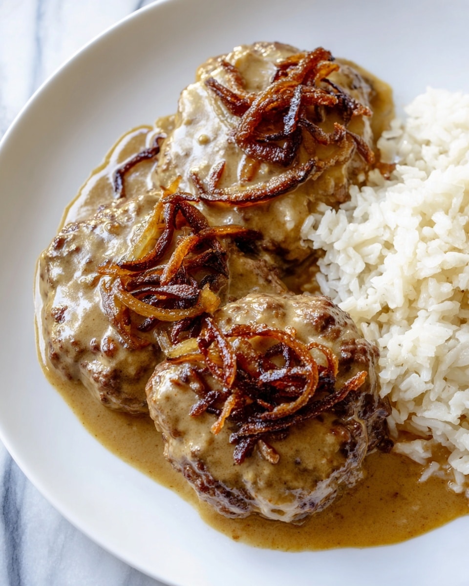 The image shows a white bowl filled with three round pieces of cooked meat covered in a brown sauce. The sauce is thick and smooth, with some small, darker caramelized onion strips scattered on top of the meat. On one side of the bowl, there is a serving of plain white rice, neatly arranged next to the saucy meat. The bowl is set on a white marbled surface. photo taken with an iphone --ar 4:5 --v 7