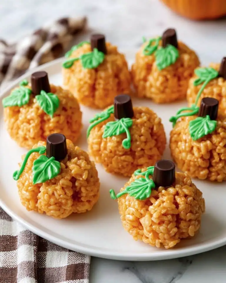 Pumpkin Rice Krispie Treats with Tootsie Roll Stems Recipe