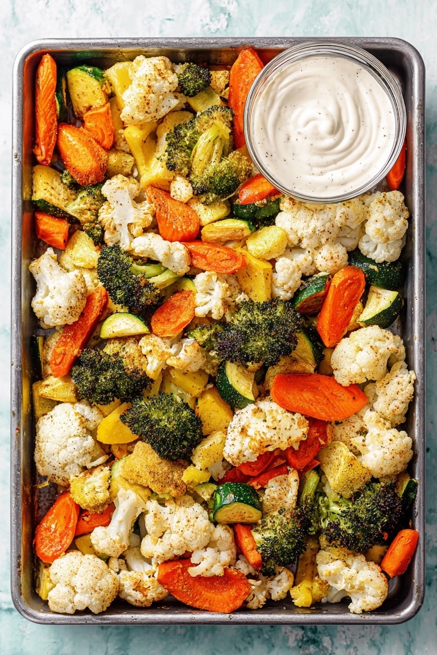 The image shows one layer of roasted vegetables spread in a large rectangular metal tray on a white marbled surface. The vegetables include orange carrot slices, green broccoli florets, white cauliflower florets, and yellow and green zucchini pieces. They are light brown in spots from roasting, with a slightly crispy texture. In the top right corner of the tray, there is a small white bowl filled with a thick, creamy white sauce with soft swirls on the surface. The colors of the vegetables are bright and fresh, and the tray is filled evenly with no empty spaces. Photo taken with an iphone --ar 2:3 --v 7 - Roasted Vegetable Medley, roasted vegetable recipe, healthy roasted vegetables, easy vegetable side dish, colorful roasted veggie mix