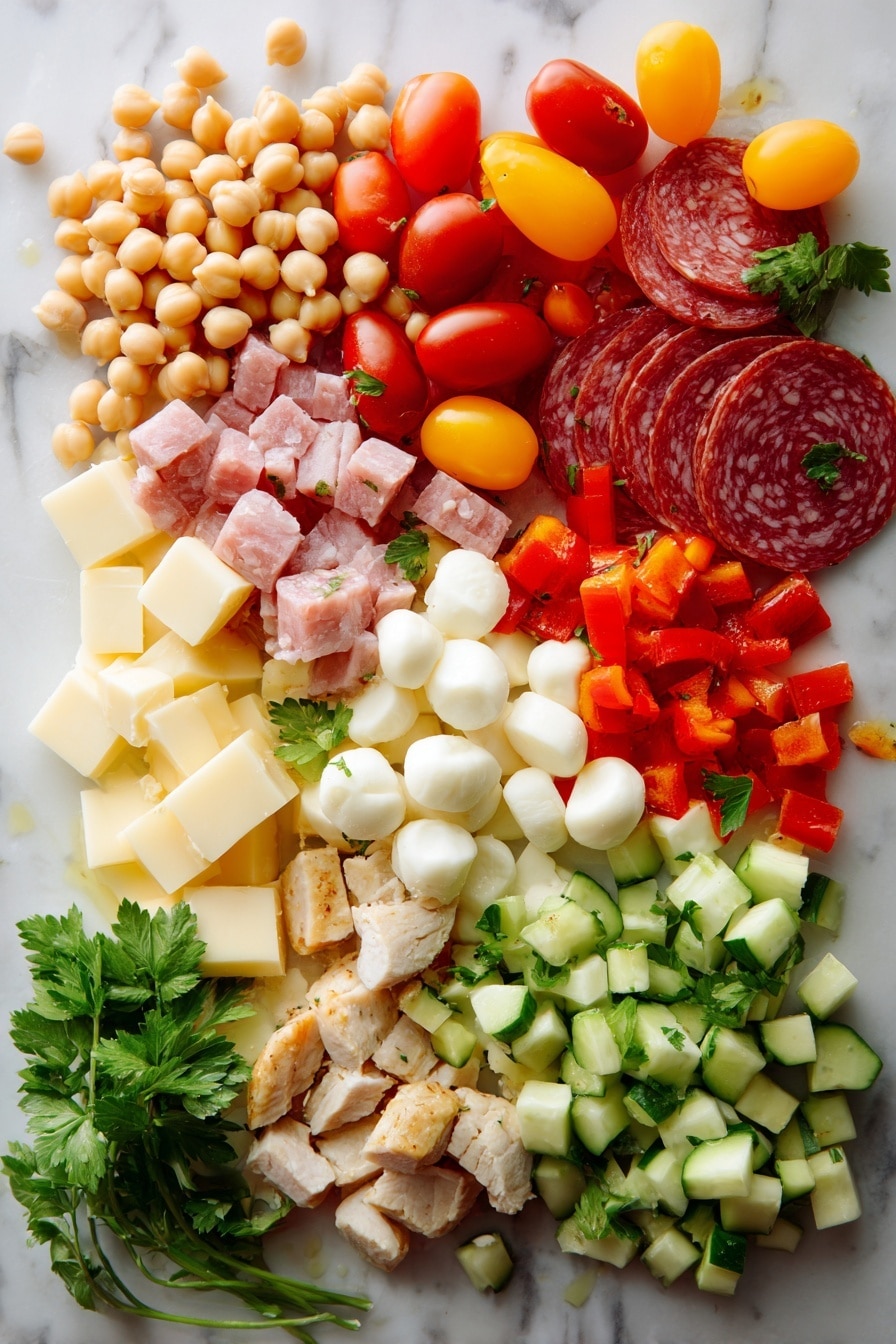 Flat lay of plump beige chickpeas and creamy white cannellini beans, vibrant quartered red and yellow grape tomatoes glistening with freshness, bright orange and red chopped sweet bell peppers showing their crisp texture, cool pale green cucumber cubes with seeds gently scooped out, thin slices of deep reddish-brown salami contrasting with cubes of creamy white mozzarella pearls and sharp pale yellow cheddar cheese, small sprigs of fresh green parsley adding a touch of brightness, and chunks of tender light golden cooked chicken, all arranged naturally with some scattered parsley leaves and a small pool of glossy deep red sun-dried tomato vinaigrette pooling slightly nearby, placed on white marbled surface, photo taken with an iphone --ar 2:3 --v 7 - Dense Bean Salad with Sun-Dried Tomato Vinaigrette, hearty bean salad, healthy veggie salad, protein-packed salads, flavorful sun-dried tomato salad