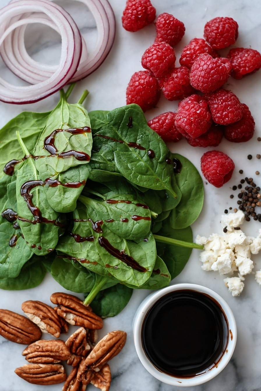 Flat lay of fresh baby spinach leaves, thinly sliced red onion rings, crumbled creamy goat cheese, toasted pecan halves, bright red fresh raspberries, a small pile of coarse black peppercorns, and a drizzle of dark balsamic glaze elegantly spread in a thin line, all beautifully arranged on a white marble surface, photo taken with an iphone --ar 2:3 --v 7 - Mixed Spinach Salad with Goat Cheese, Raspberries, and Toasted Pecans, spinach salad with goat cheese and raspberries, healthy berry spinach salad, easy gourmet salads, fresh fruit and nut salads