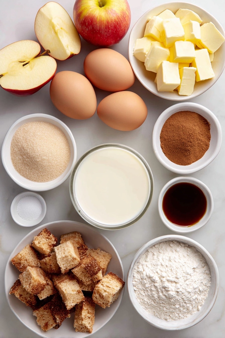 Flat lay of peeled, cored, and sliced fresh apples arranged neatly, diced rustic French bread cubes, six whole large eggs with clean shells, a small white ceramic bowl of whole milk, a small white ceramic bowl of heavy cream, a small white ceramic bowl filled with granulated sugar, a small white ceramic bowl with light brown sugar, a small white ceramic bowl containing all-purpose flour, a small white ceramic bowl holding ground cinnamon, a small white ceramic bowl with ground nutmeg, diced salted butter cubes arranged artfully on a simple white ceramic plate, and a small white ceramic bowl of clear vanilla extract placed symmetrically, all on a clean white marble surface, soft natural light, photo taken with an iPhone, professional food photography style, fresh ingredients, white ceramic bowls, no bottles, no duplicates, no utensils, no packaging --ar 2:3 --v 7 --p awthu7i m7354615311229779997 - Apple French Toast Casserole, apple cinnamon breakfast, easy baked french toast, cozy brunch dish, apple dessert casserole