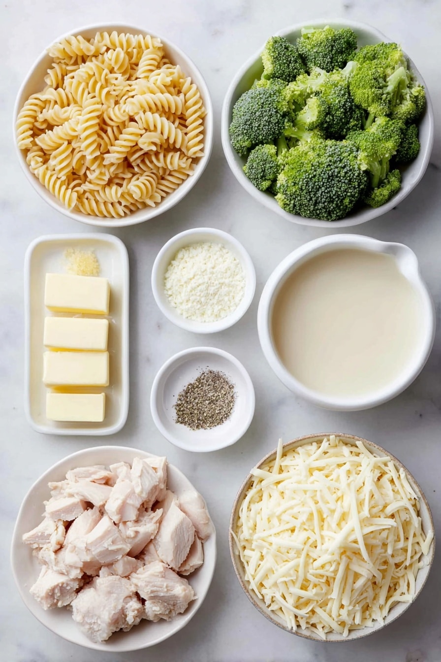 Flat lay of a small pile of uncooked rotini pasta spirals, fresh bright green broccoli florets cut into bite-size pieces, three glossy unsalted butter cubes, a small mound of finely chopped yellow onion, a small heap of all-purpose flour, a small white ceramic bowl filled with pale golden chicken broth, another small white ceramic bowl holding creamy whole milk, a tiny white ceramic bowl with mixed Italian seasoning herbs, a separate tiny white ceramic bowl containing fine garlic powder, a small white ceramic bowl with coarse salt crystals, another small white ceramic bowl with ground black pepper, bite-size pieces of cooked chicken breast arranged naturally, and a neat pile of shredded sharp cheddar cheese, all arranged symmetrically and balanced on a clean white marble surface, soft natural light, photo taken with an iPhone, professional food photography style, fresh ingredients, white ceramic bowls, no bottles, no duplicates, no utensils, no packaging --ar 2:3 --v 7 --p awthu7i m7354615311229779997 - Easy Chicken Noodle Casserole, chicken noodle casserole, creamy chicken pasta bake, family-friendly dinner recipes, simple casserole ideas