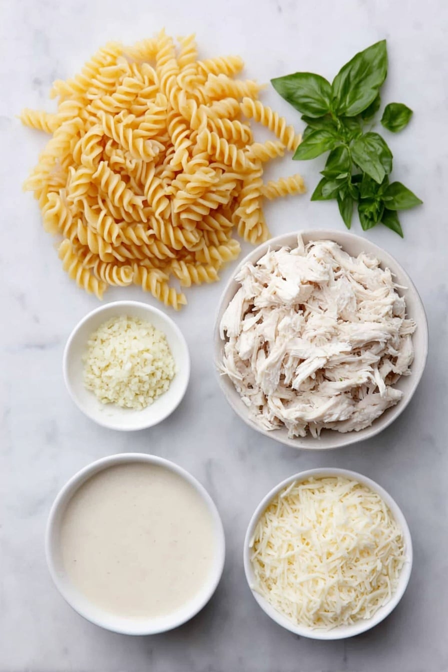 Flat lay of uncooked rotini pasta in a small heap, a few pieces of shredded rotisserie chicken piled neatly, a small white bowl filled with creamy Alfredo sauce, a small white bowl holding chicken stock, a small white bowl with finely minced garlic, a small white bowl heaped with shredded mozzarella cheese, a small white bowl containing grated Parmesan cheese, and a few sprigs of fresh basil, oregano, and parsley arranged symmetrically, all placed on a clean white marble surface, soft natural light, photo taken with an iPhone, professional food photography style, fresh ingredients, white ceramic bowls, no bottles, no duplicates, no utensils, no packaging --ar 2:3 --v 7 --p awthu7i m7354615311229779997 - Easy Chicken Alfredo Casserole, Chicken Alfredo casserole, creamy chicken pasta bake, weeknight chicken dinner, cheesy chicken casserole