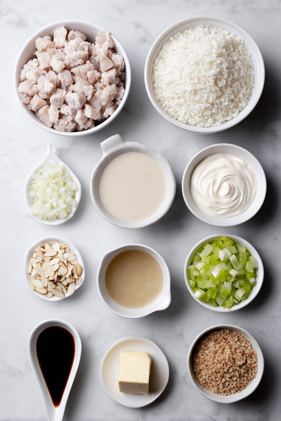 Flat lay of cooked diced turkey pieces, cooked white rice grains in a small white ceramic bowl, a small white bowl of creamy condensed mushroom soup, a small white bowl filled with clear chicken broth, a small white bowl with smooth, pale mayonnaise, a small white bowl holding thick, white sour cream, a small pile of finely diced small onion, a small pile of finely diced celery stalks, a heap of slivered almonds, a small white bowl containing coarse crushed Ritz cracker crumbs, and a small white bowl with melted golden butter, all ingredients fresh and natural, arranged symmetrically in perfect proportions in simple white ceramic bowls, placed on a clean white marble surface, soft natural light, photo taken with an iPhone, professional food photography style, fresh ingredients, white ceramic bowls, no bottles, no duplicates, no utensils, no packaging --ar 2:3 --v 7 --p m7354615311229779997 - Leftover Turkey Rice Casserole, Thanksgiving leftovers recipe, easy turkey casserole, quick holiday dinner ideas, cozy comfort food