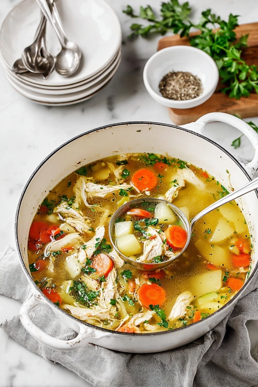 A big white pot filled with light brown clear broth with many ingredients floating in it, including shredded white chicken pieces, round orange carrot slices, small white potato chunks, and small green celery pieces. Fresh green parsley leaves are sprinkled on top, and some black pepper is visible in the broth. A silver ladle is resting inside the pot, partly submerged in the soup, revealing a close-up of the vegetable and chicken mix. The pot sits on a grey cloth on a white marbled surface with a small white bowl of black pepper in the upper left corner. Photo taken with an iphone --ar 2:3 --v 7 - Ultimate Chicken Soup, chicken soup recipe, cozy chicken soup, homemade chicken soup, healthy chicken soup
