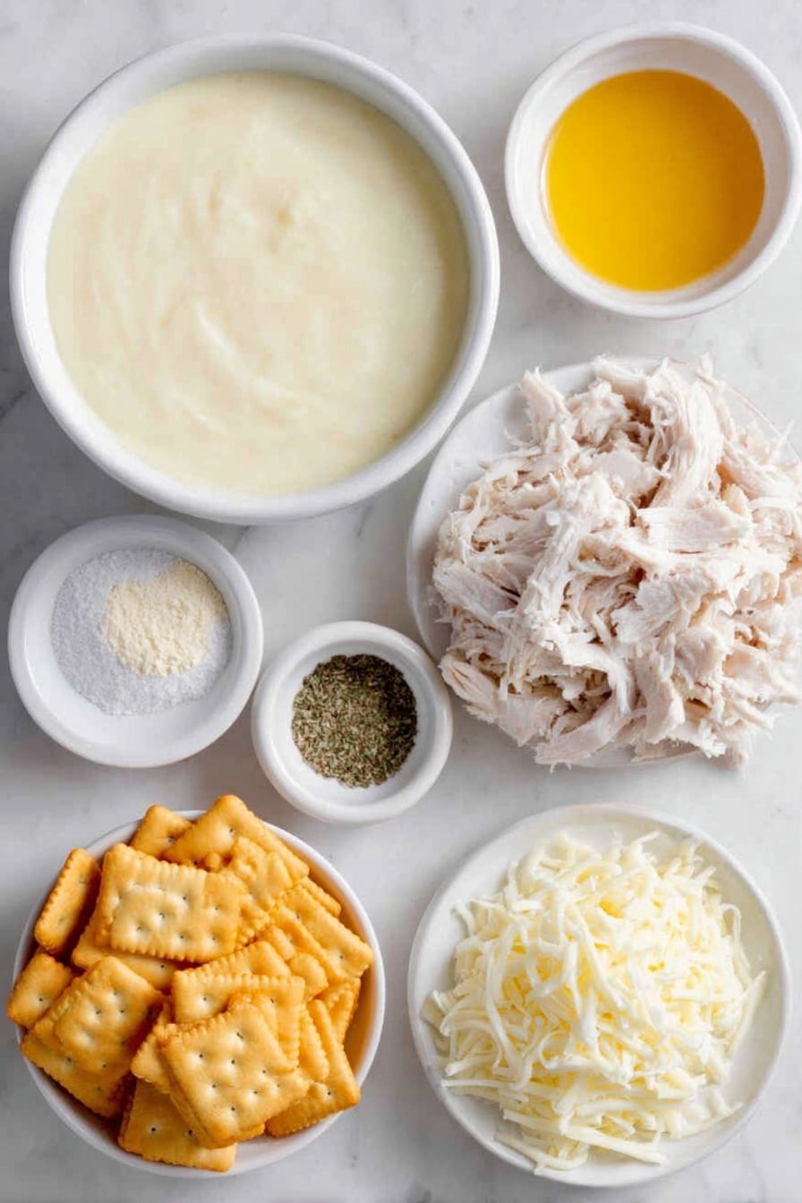 Flat lay of two white ceramic bowls—one filled with thick creamy condensed cream of chicken soup, the other holding smooth sour cream; a small white bowl with fine pale onion powder, another small white bowl with powdery garlic powder; a small white bowl containing coarse kosher salt next to a small white bowl with ground black pepper; a heaping pile of shredded cooked chicken arranged neatly; a mound of shredded sharp cheddar cheese; a small white bowl holding melted golden butter; and a cluster of lightly crushed shiny golden Ritz crackers, all placed on a clean white marble surface, soft natural light, photo taken with an iPhone, professional food photography style, fresh ingredients, white ceramic bowls, no bottles, no duplicates, no utensils, no packaging --ar 2:3 --v 7 --p awthu7i m7354615311229779997 - Creamy Chicken Casserole, Chicken casserole recipe, comfort food dinner, easy chicken casserole, cheesy chicken casserole