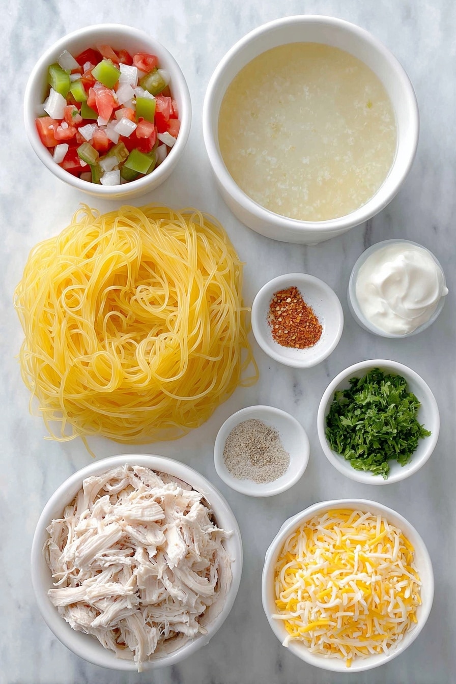 Flat lay of dry spaghetti pasta nest, two cans of cream of chicken soup opened with creamy soup visible, a small white bowl of diced fresh red and green tomatoes with jalapeños (representing Rotel), a small white bowl of thick sour cream, a small white bowl of clear chicken broth, a small white bowl filled with shredded Mexican cheese blend, a small white bowl of mixed garlic powder and onion powder, a small white bowl containing coarse salt and black pepper, a small white bowl with crushed red pepper flakes, a small pile of shredded rotisserie chicken breast, and a small white ceramic dish with freshly chopped parsley, all arranged symmetrically and proportionately on a clean white marble surface, soft natural light, photo taken with an iPhone, professional food photography style, fresh ingredients, white ceramic bowls, no bottles, no duplicates, no utensils, no packaging --ar 2:3 --v 7 --p m7354615311229779997 - Cheesy Chicken Spaghetti Bake, easy cheesy chicken casserole, comforting pasta bake, creamy chicken spaghetti, family-friendly pasta dish