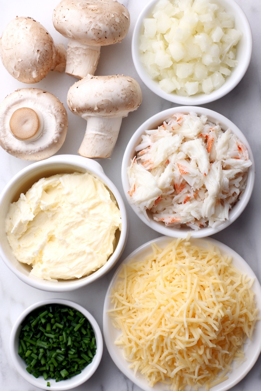 Flat lay of fresh whole white button mushrooms with stems removed, a small pat of creamy butter, finely diced white onion in a small white bowl, minced garlic cloves beside the bowl, fresh lump crab meat arranged delicately on a white ceramic plate, a small white bowl of softened cream cheese, shredded Monterey Jack cheese loosely piled on a white dish, finely grated Parmesan cheese in a tiny white bowl, a few vibrant green sliced chives scattered neatly on the surface, and a small white bowl of golden panko breadcrumbs, all arranged symmetrically on a clean white marble surface, soft natural light, photo taken with an iPhone, professional food photography style, fresh ingredients, white ceramic bowls, no bottles, no duplicates, no utensils, no packaging --ar 2:3 --v 7 --p m7354615311229779997 - Crab Stuffed Mushrooms, Crab Stuffed Mushrooms appetizer, easy crab mushroom recipe, elegant crab mushroom bites, creamy cheesy stuffed mushrooms