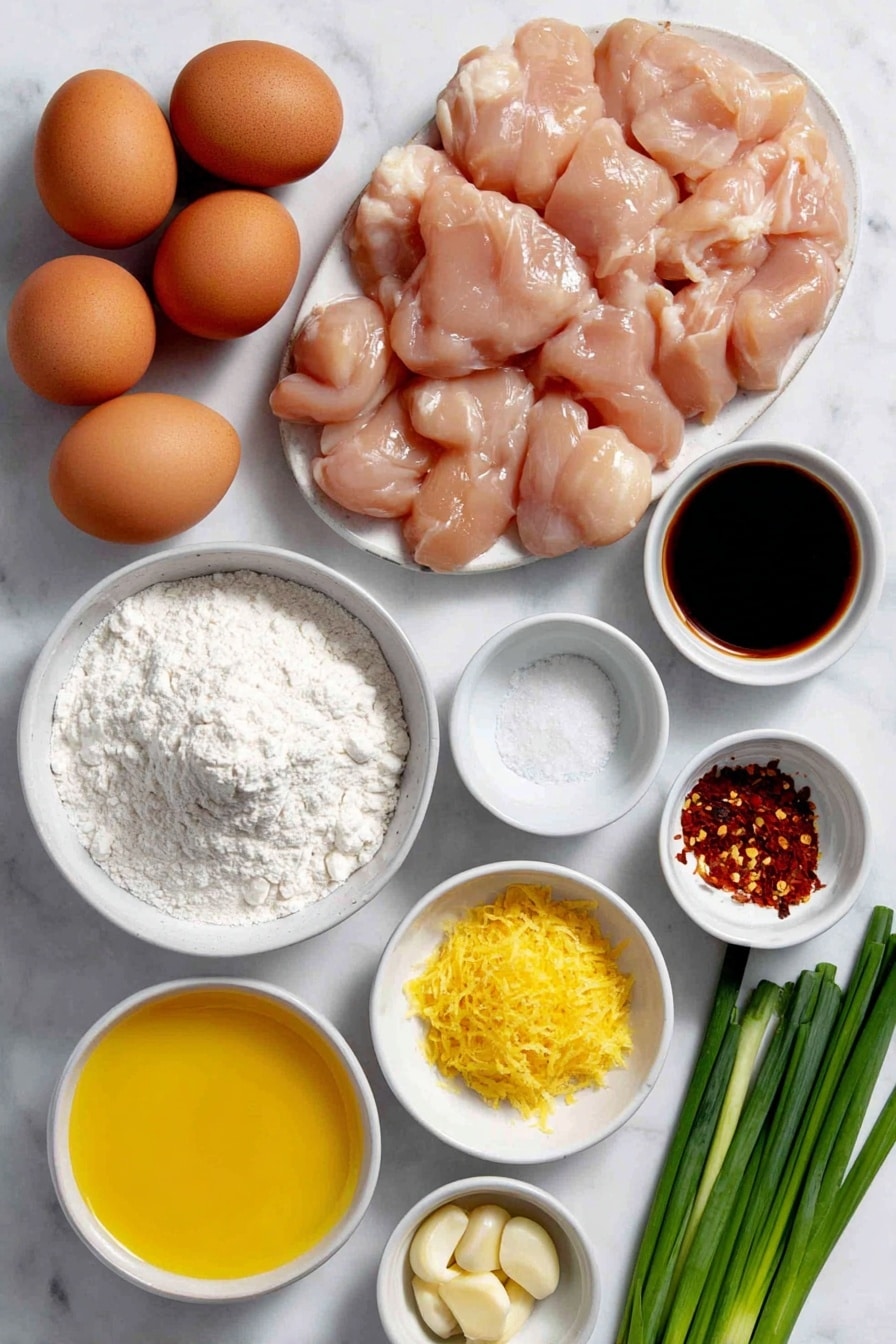 Flat lay of boneless skinless chicken breasts cut into bite-size pieces arranged neatly, three whole uncracked brown eggs, a small white ceramic bowl of cornstarch, a small white ceramic bowl of flour mixed with salt, a small mound of bright orange zest from one orange, a small white ceramic bowl filled with fresh orange juice, a small white ceramic bowl of granulated sugar, a small white ceramic bowl of clear rice vinegar, a small white ceramic bowl of dark soy sauce, a small white ceramic bowl containing finely diced garlic cloves, a small white ceramic bowl with red chili flakes, a small bundle of fresh green onions with green and white parts visible, placed on a clean white marble surface, soft natural light, photo taken with an iPhone, professional food photography style, fresh ingredients, white ceramic bowls, no bottles, no duplicates, no utensils, no packaging --ar 2:3 --v 7 --p m7354615311229779997 - Crispy Chinese Orange Chicken, Chinese Orange Chicken, Easy Orange Chicken, Homemade Orange Chicken, Orange Chicken stir-fry