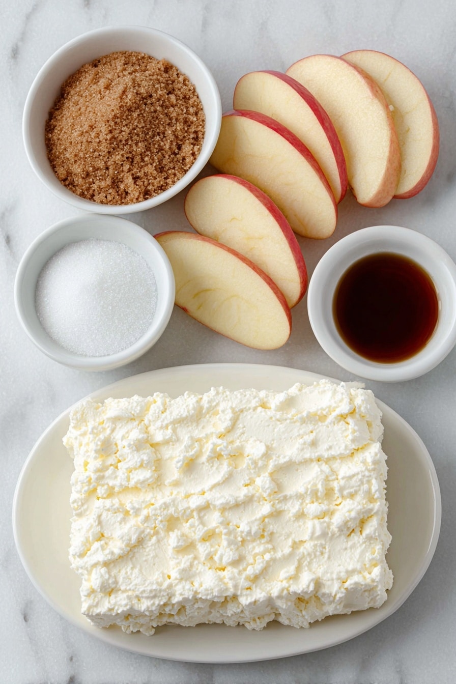 Flat lay of a block of softened cream cheese on a simple white ceramic plate, a small white bowl filled with packed brown sugar, another small white bowl containing granulated white sugar, a small white bowl with clear vanilla extract, and several fresh, crisp apple slices arranged neatly on a simple white ceramic dish, all ingredients fresh and natural, perfect symmetry, balanced layout placed on a clean white marble surface, soft natural light, photo taken with an iPhone, professional food photography style, fresh ingredients, white ceramic bowls, no bottles, no duplicates, no utensils, no packaging --ar 2:3 --v 7 --p m7354615311229779997 - Easy Caramel Apple Dip, caramel apple dip, fall dip recipes, simple apple dip, quick party snacks
