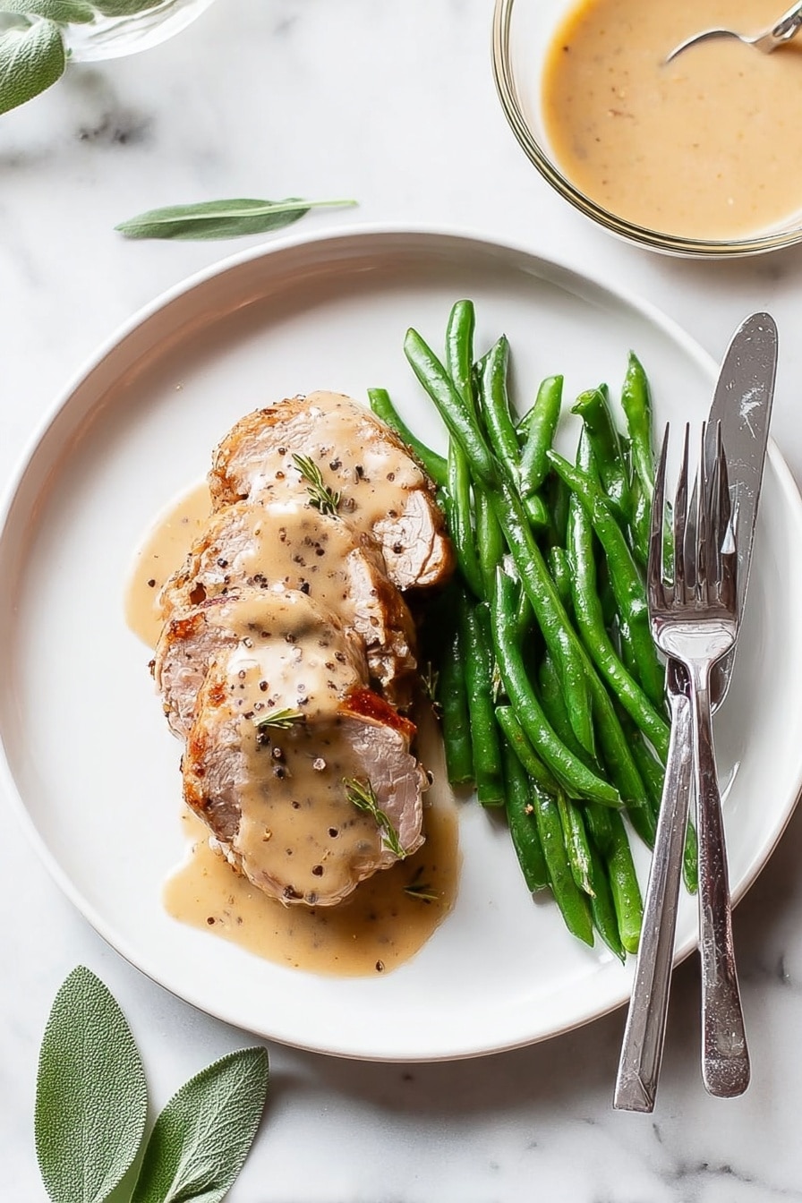 The image shows four slices of roasted chicken with golden brown, slightly crispy skin on top, placed in a row on a white plate with a gray rim. Each slice shows two layers: the top crispy skin with a rich, golden color and some charred spots, and the inner white meat beneath, which looks tender and juicy. Some green leaves are visible in the background, resting on the white marbled surface under the plate. The scene is close-up, highlighting the texture of the roasted skin and the softness of the chicken meat. Photo taken with an iphone --ar 2:3 --v 7 - Turkey Roulade with Cranberry Stuffing, festive turkey roulade, holiday centerpieces, cranberry stuffed turkey, elegant holiday mains