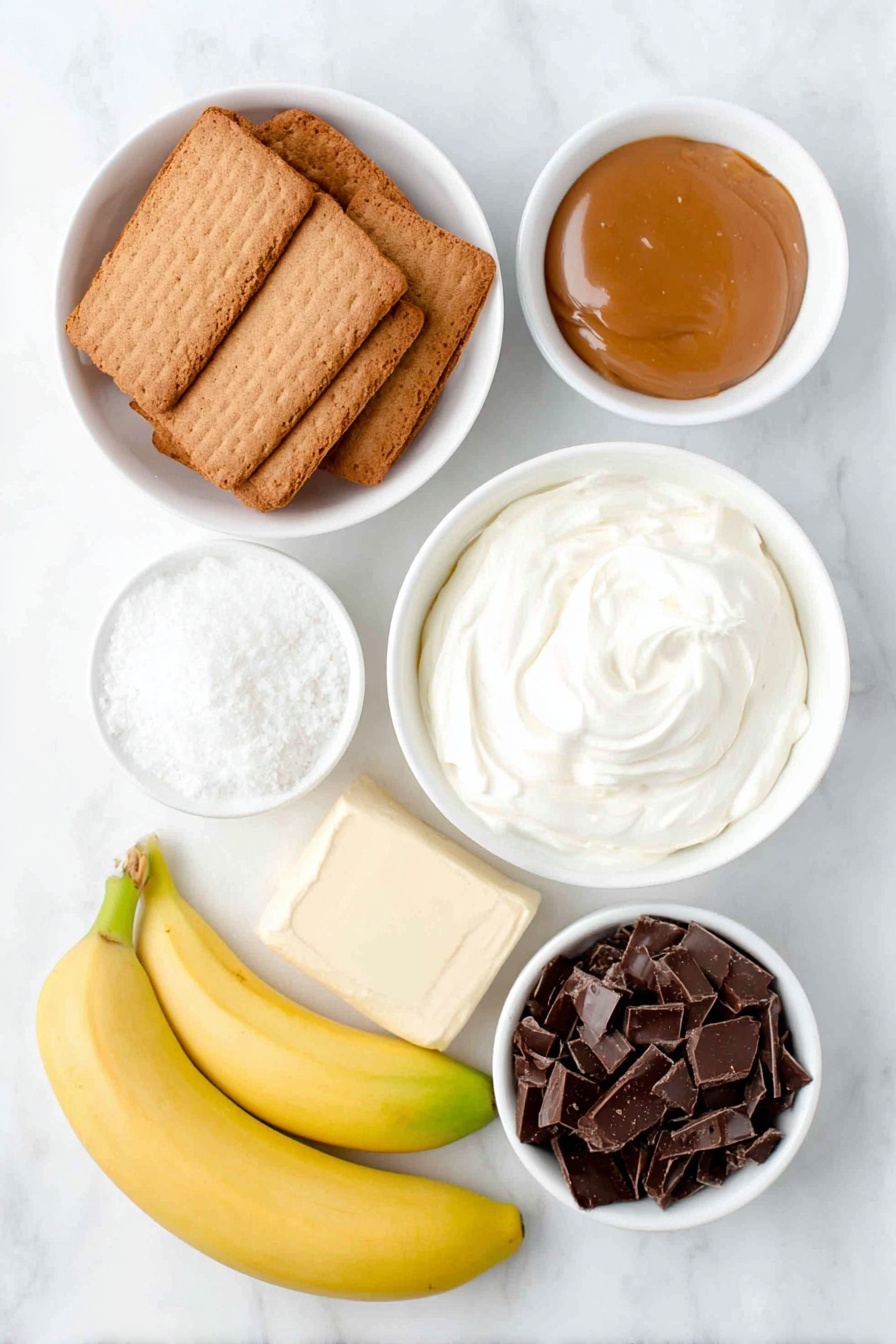 Flat lay of a small white ceramic bowl filled with golden brown whole digestive biscuits, a small white ceramic bowl with melted unsalted butter shining softly, a small white ceramic bowl holding thick golden caramel sauce, two whole ripe bananas with smooth yellow skin beside a few banana slices neatly arranged, a small white ceramic bowl filled with thick double cream, a small white ceramic bowl containing fine white icing sugar, a small white ceramic bowl showcasing delicate dark chocolate curls, all ingredients fresh and natural, perfectly balanced and symmetrical, placed on a clean white marble surface, soft natural light, photo taken with an iPhone, professional food photography style, fresh ingredients, white ceramic bowls, no bottles, no duplicates, no utensils, no packaging --ar 2:3 --v 7 --p m7354615311229779997 - No-Bake Banoffee Pie, easy banoffee dessert, no-bake pie recipe, caramel banana pie, quick dessert ideas