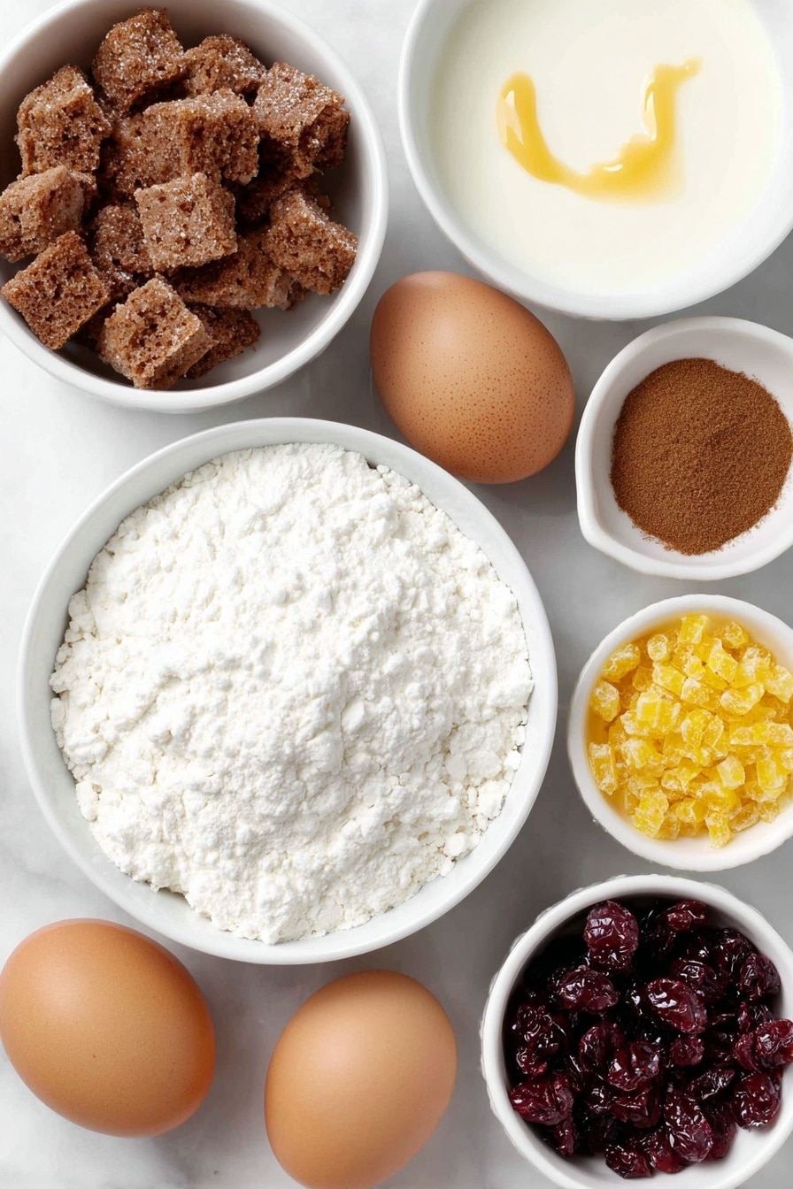 Flat lay of roughly one cup of dried bread cubes, a small white bowl of condensed milk, a small white bowl of milk, three whole uncracked brown eggs, a small white bowl with ground cinnamon powder, a small white bowl of mini toffee bits, a small white bowl of dried cranberries, a small white bowl holding grated orange peel, a small white bowl filled with caramel sundae sauce, arranged symmetrically on a clean white marble surface, soft natural light, photo taken with an iPhone, professional food photography style, fresh ingredients, white ceramic bowls, no bottles, no duplicates, no utensils, no packaging --ar 2:3 --v 7 --p m7354615311229779997 - Cranberry Easy Bread Pudding with Toffee, cranberry bread pudding, festive bread pudding, holiday dessert recipes, easy bread pudding with cranberries