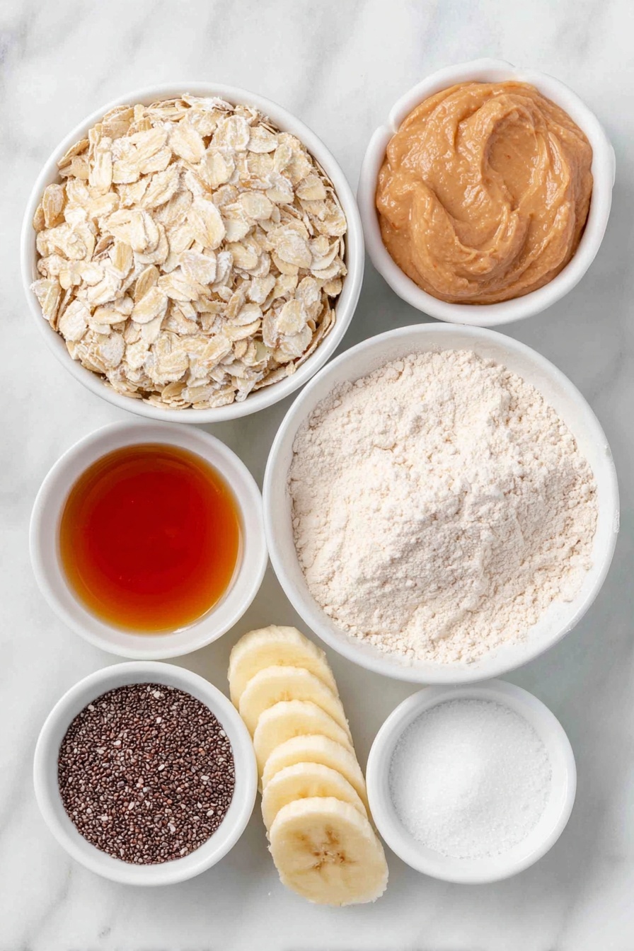 Flat lay of a small heap of rolled oats, a half small banana sliced into thin rounds, a small white ceramic bowl filled with unsweetened almond milk, a small white ceramic bowl containing creamy natural peanut butter, a small white ceramic bowl with golden maple syrup, a small white ceramic bowl with tiny black chia seeds, a small white ceramic bowl of light beige protein powder, a small white ceramic bowl holding pure vanilla extract, and a small white ceramic bowl with fine sea salt, all arranged in perfect symmetry on a clean white marble surface, soft natural light, photo taken with an iPhone, professional food photography style, fresh ingredients, white ceramic bowls, no bottles, no duplicates, no utensils, no packaging --ar 2:3 --v 7 --p m7354615311229779997 - Healthy Protein Overnight Oats, healthy breakfast ideas, high-protein oats, quick and easy breakfast recipes, nutritious overnight oats