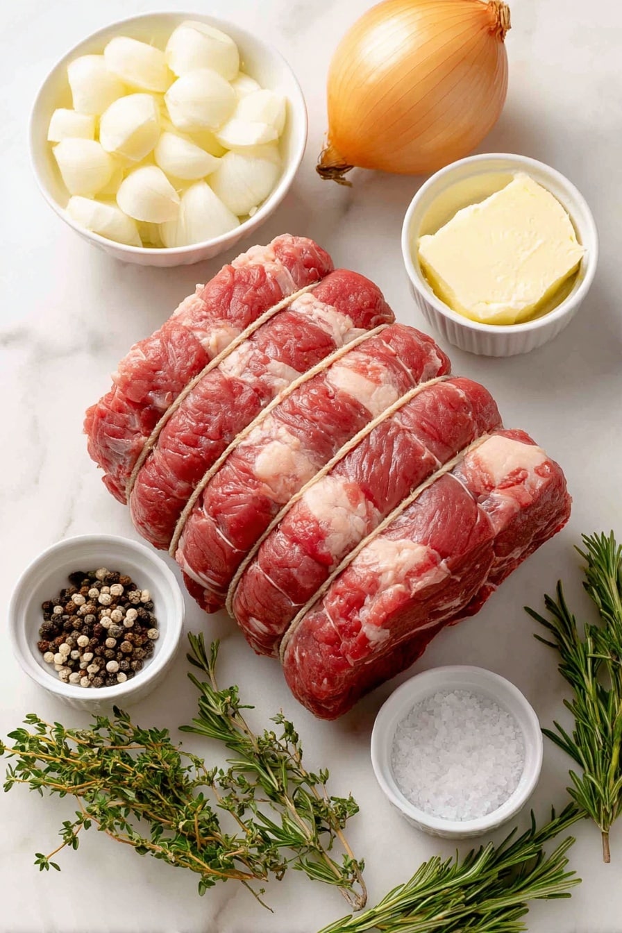 Flat lay of a large bone-in prime rib roast tied with kitchen twine, a small white ceramic bowl of softened butter, a few peeled garlic cloves, a small white bowl of coarse kosher salt crystals, fresh thyme sprigs with tiny green leaves, fresh rosemary sprigs, whole black peppercorns scattered neatly, a medium yellow onion quartered, all ingredients arranged symmetrically on a clean white marble surface, soft natural light, photo taken with an iPhone, professional food photography style, fresh ingredients, white ceramic bowls, no bottles, no duplicates, no utensils, no packaging --ar 2:3 --v 7 --p m7354615311229779997 - Perfect Garlic Herb Prime Rib, garlic herb prime rib, prime rib recipe, savory roast beef, holiday prime rib